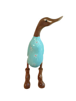 A Bamboo And Teak  Duck With  Pretty White   Flowers And Boots