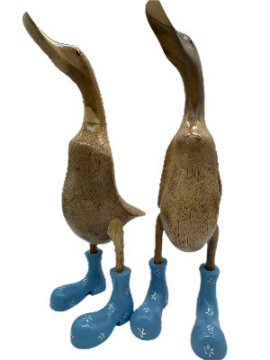 A Duck Wooden With Blue   Boots And Flowers