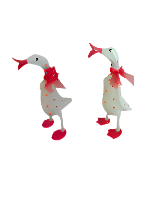 A Wooden Coloured Chatter Duck White With  Red  Polka Dots Just Landed