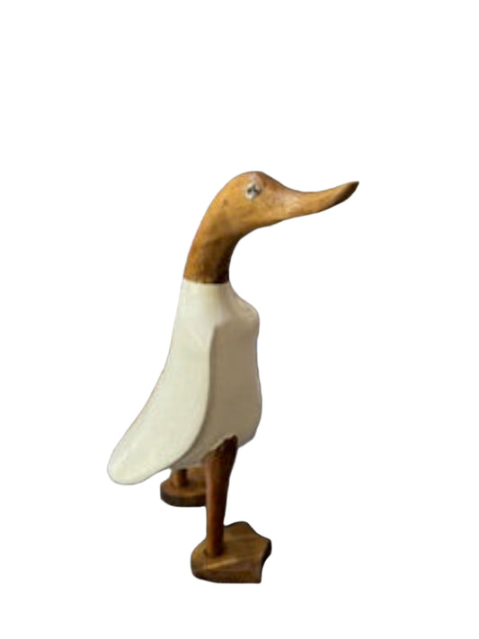 A Wooden Duck With White Body And Webbed Feet